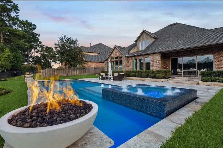 Pool lighting in the evening The Woodlands TX backyard