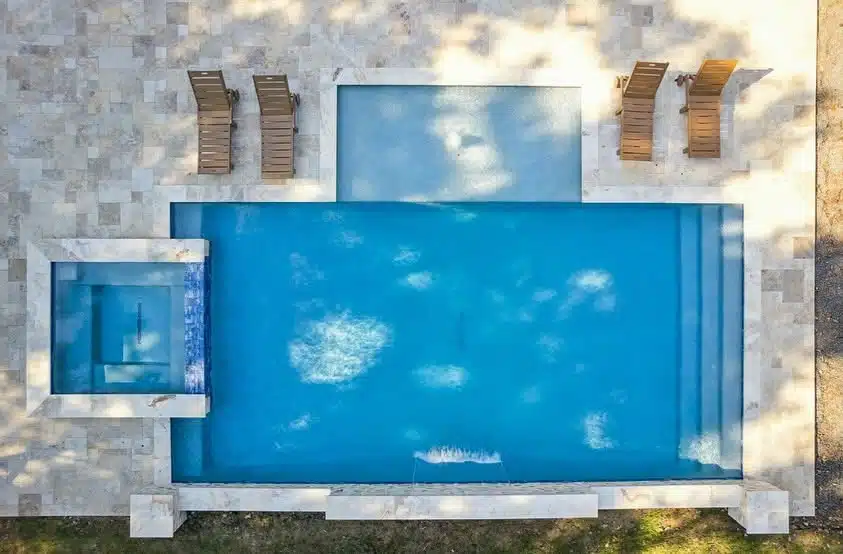 Clear swimming pool water morning light Houston area